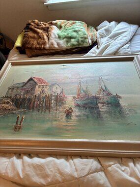 Beautiful Artist picture of boat house with some boats near by